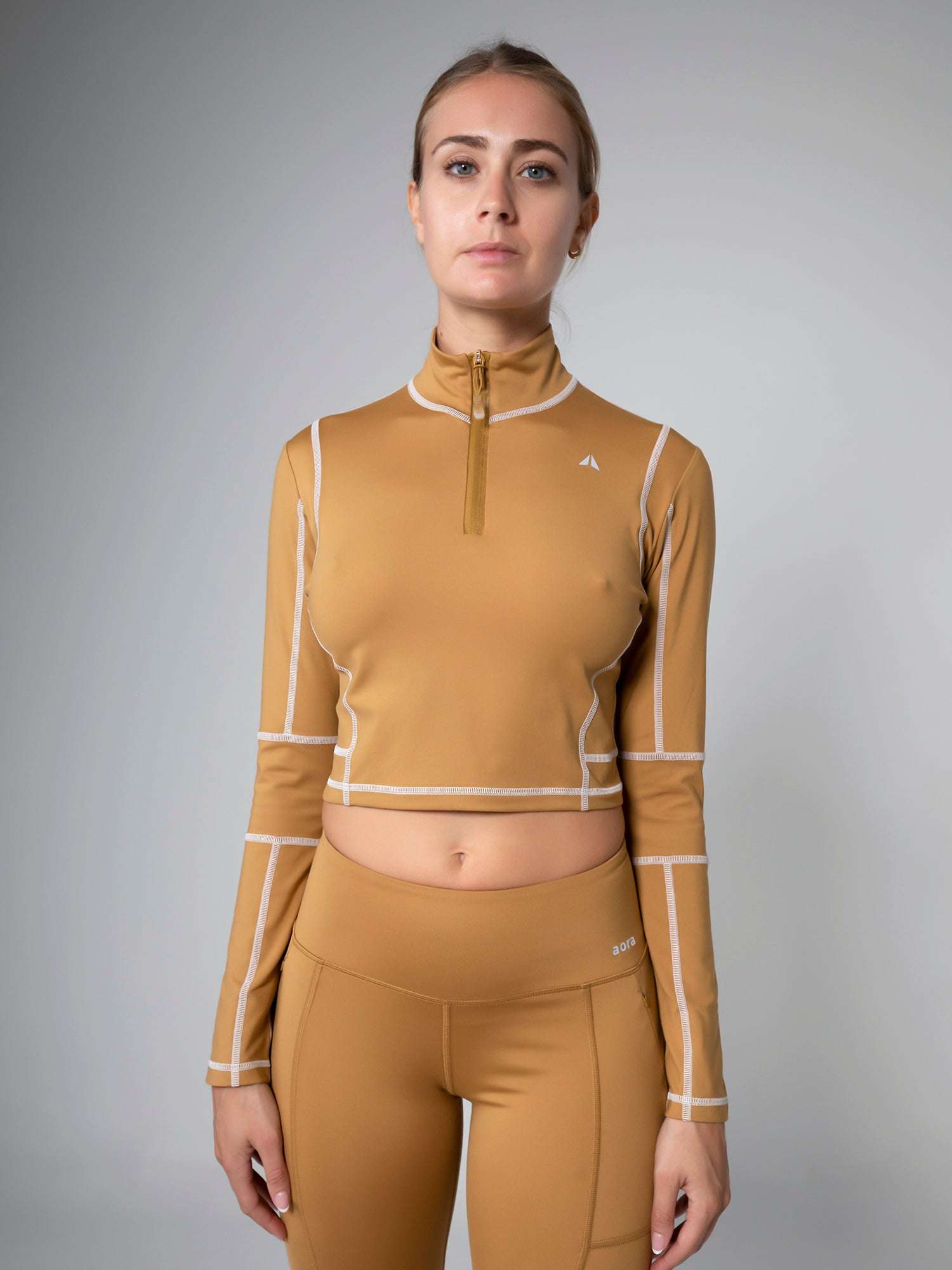 KANZEI ZIP LONGSLEEVE For Women - Aora Athliesure Shop online in Abu Dhabi